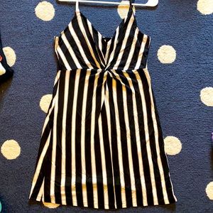 Black, tan, and white striped sundress